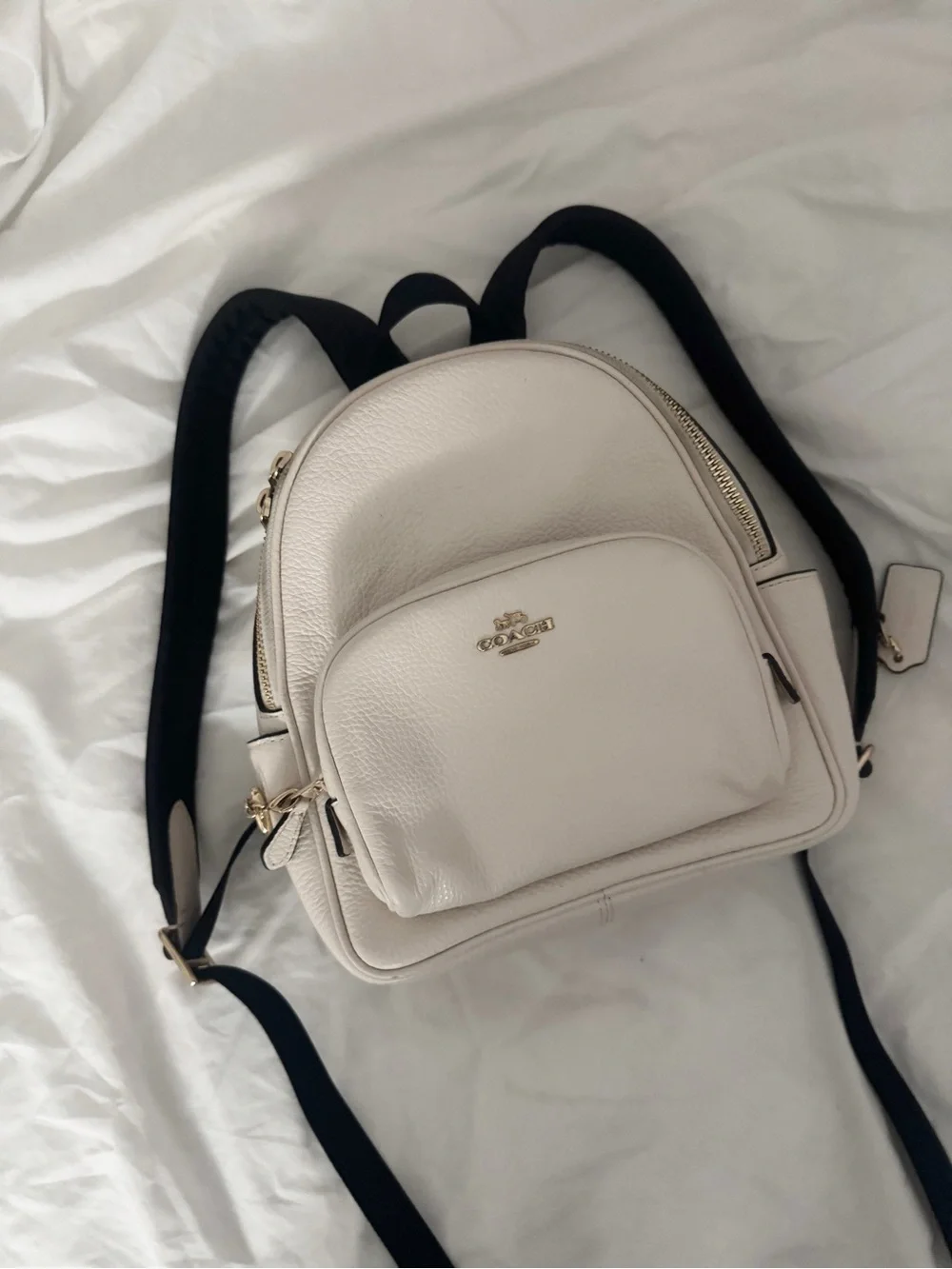 Coach Pebble Leather Mini Backpack in Cream with Black Straps